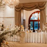 big curtains and long table