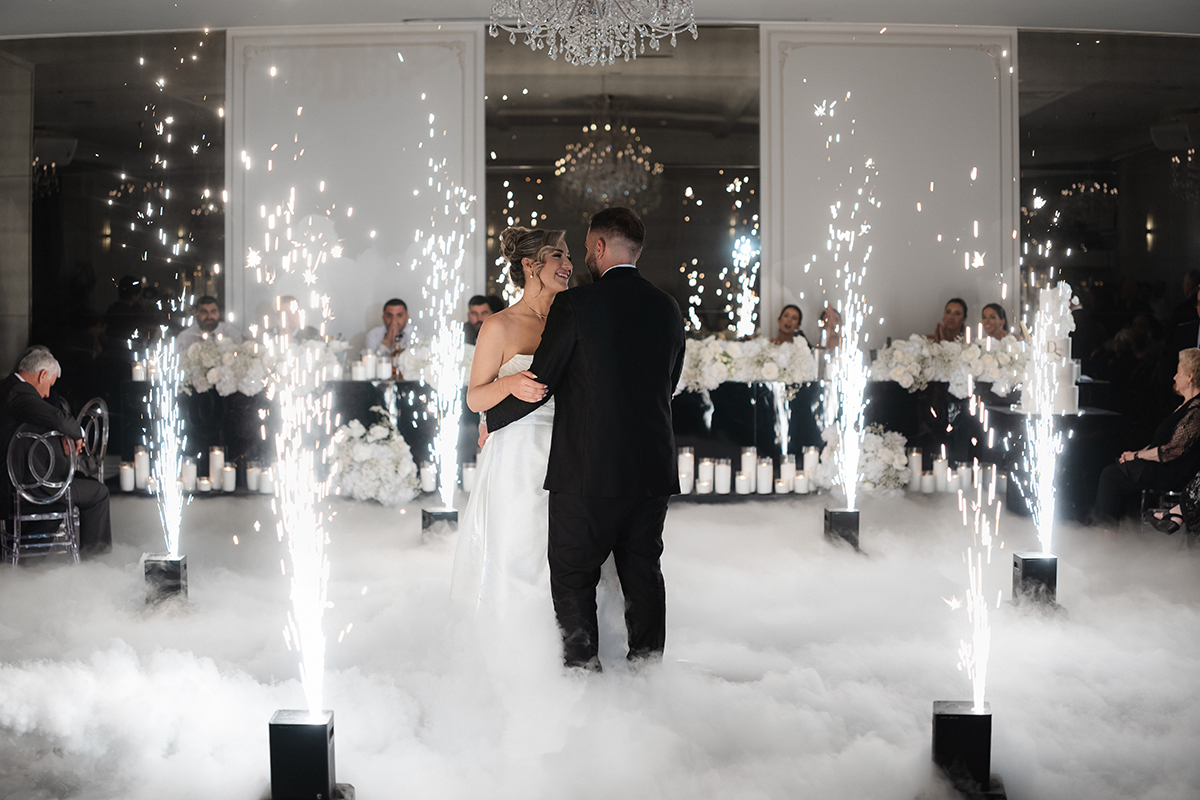 Bride and Groom Dancing in Classic Ballroom at Conca D'oro with fireworks