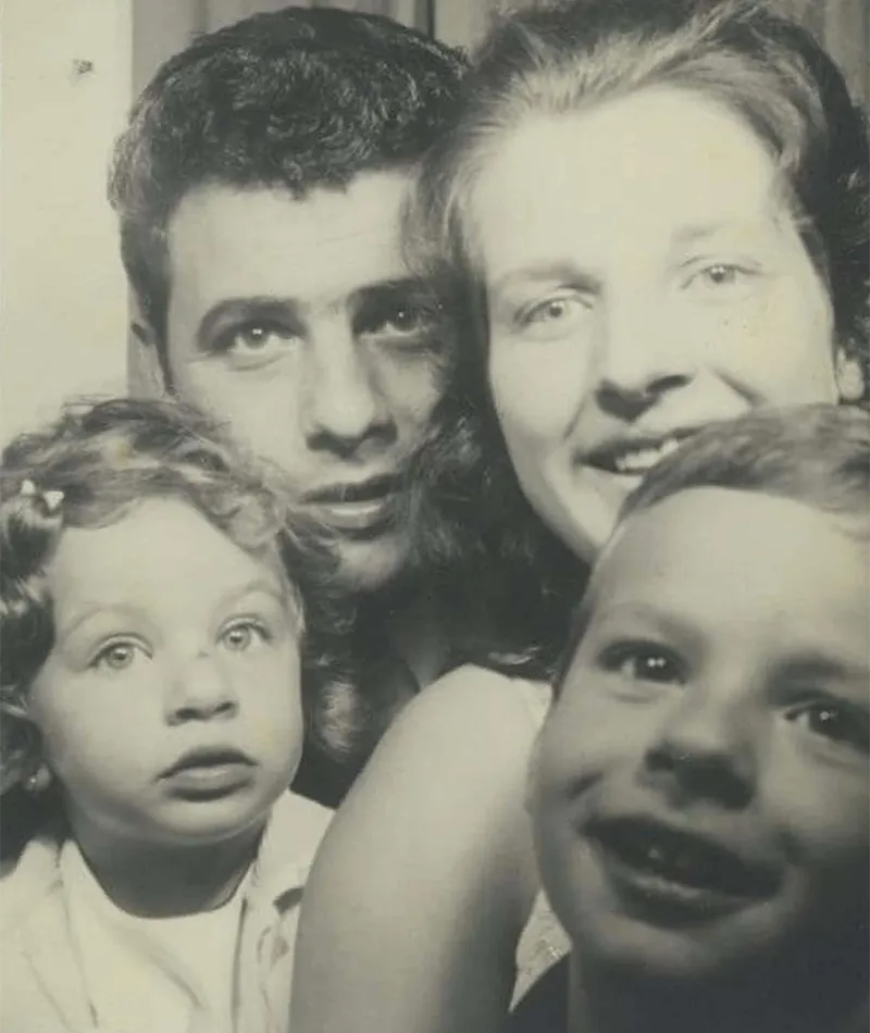 Black and white close-up portrait of Filippo Navarra with his family.