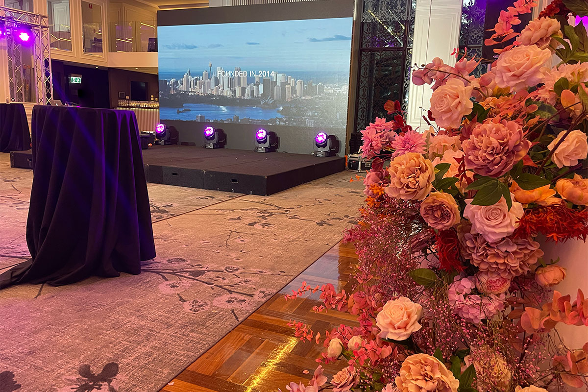 Room and stage setup for corporate event at Curzon hall