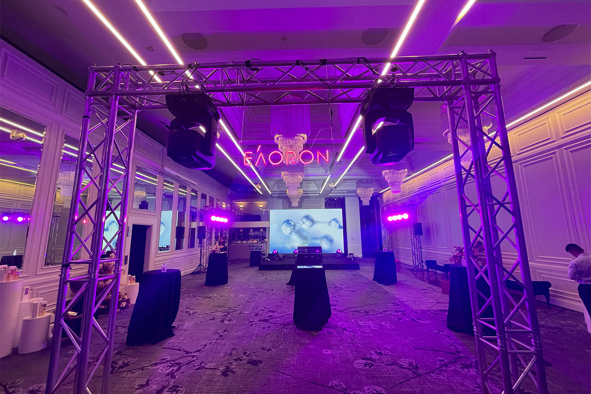 Room and stage setup for corporate event at Curzon hall with lighting and audio