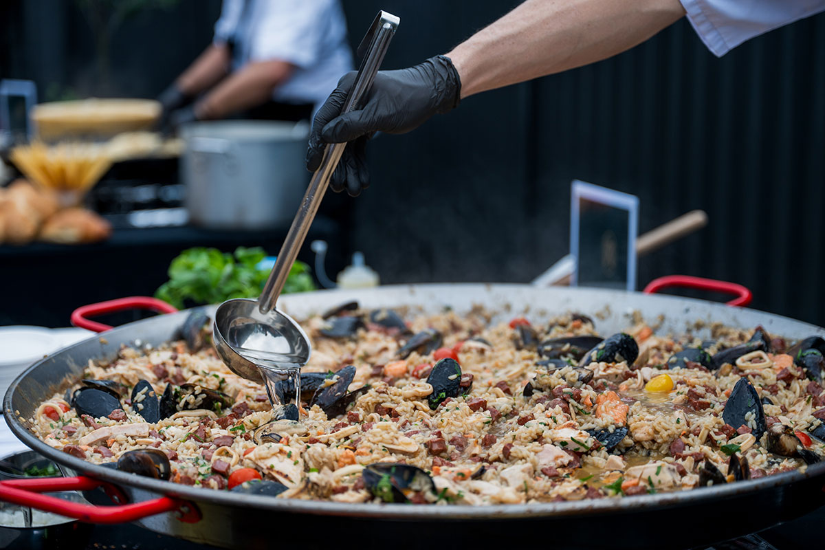 Traditional Seafood, Chicken & Chorizo Paella by Oro Catering